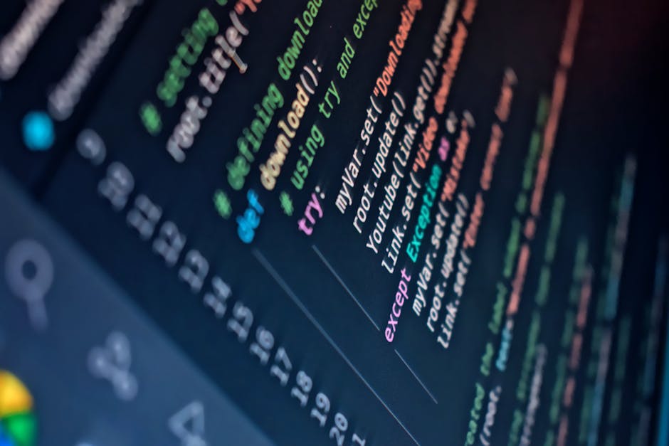 Close-up of a computer screen displaying colorful lines of code in various shades of green, blue, pink, and orange on a dark background. The code includes commands related to URL updates and link sett